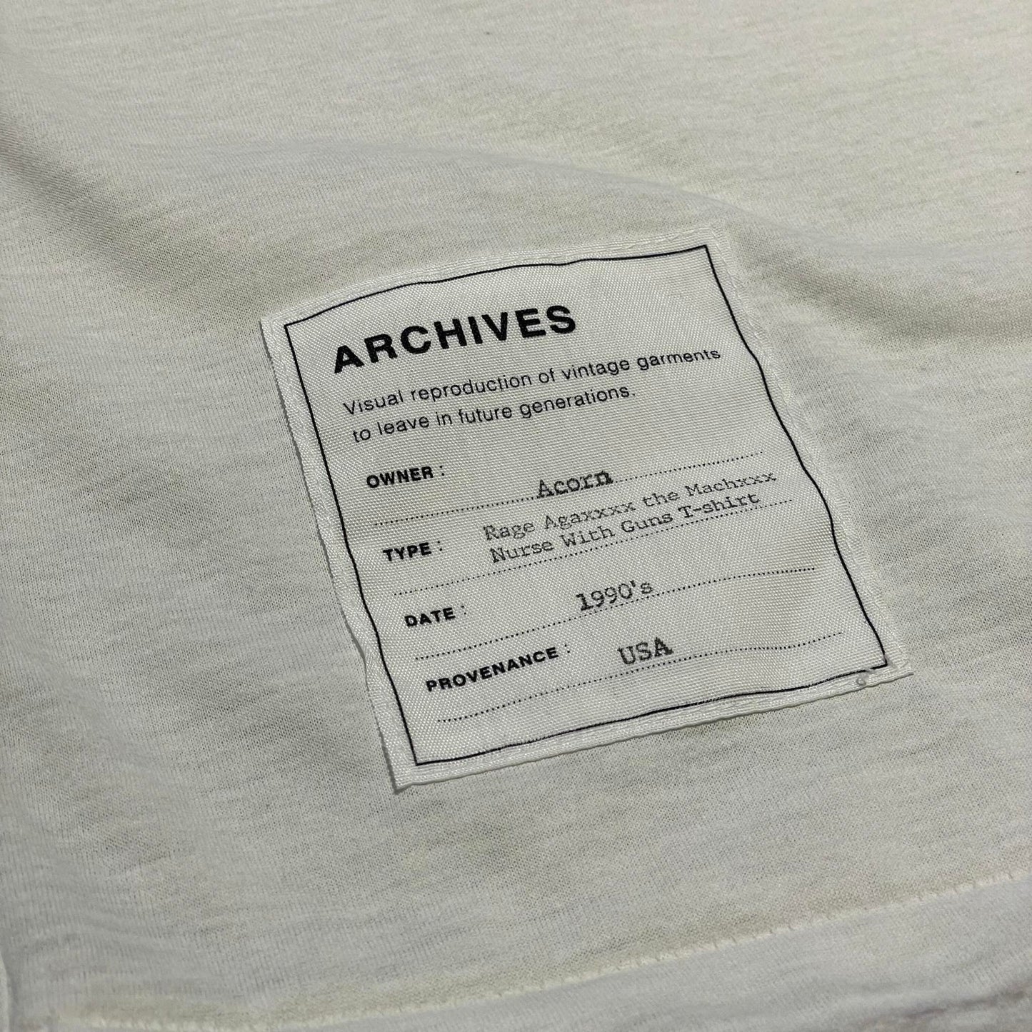 トルク 24-2205 REAG AGEXXXX THE MACHXXXX NURSE WICH GUNS T-SHIRT
