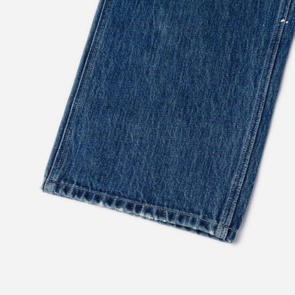 ウォッシュ＆ダメージ大黒プリントリラックスフィットジーンズ:インディゴ