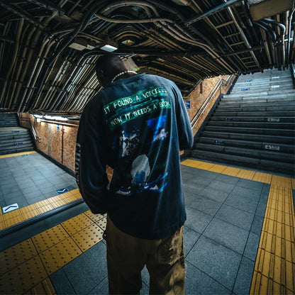 セントマイケル SM-YS1-0000-C34 GS_LS TEE / ILYA GITS / BLACK メンズ GHOST IN THE SHELL/攻殻機動隊 コラボ プリント ロンT